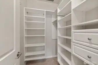 Primary bedroom offers walk in closet and storage galore