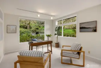 Third bedroom with three walls of windows