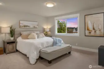 Main Floor Primary Suite with dual closets with custom built-in organizers