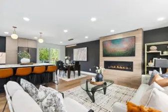 Great room with gas fireplace with floor to ceiling tile