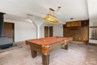 Second living room with pool table.