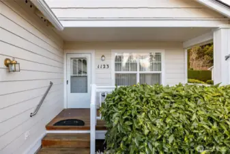 Only 3 stairs up to the front door and seating area on the porch