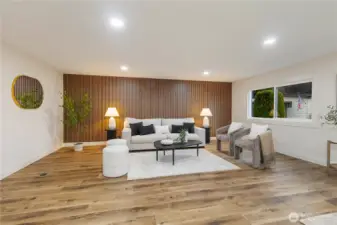 Wood slat wall design in living space sets a warm tone.