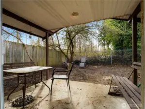 Like sitting outside no matter what the weather is? This covered patio will keep you dry.