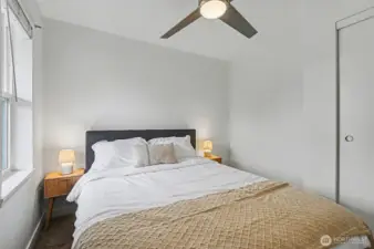 Front Bedroom - Staged with queen bed and and side tables and brand new ceiling-light fan