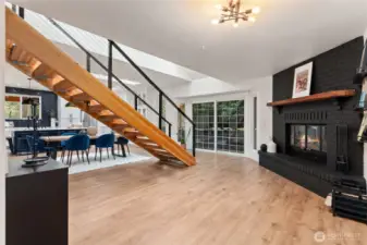 Open floor-plan with wood burning fireplace perfect for cozy nights!