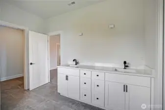 Mirror is Installed Over Dual Vanities~