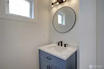 Guest Powder on Main Floor Opposite Garage Entrance~