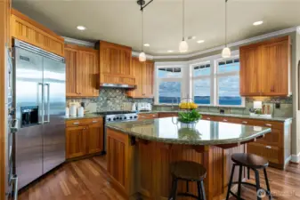 Gather around the island in this main floor kitchen