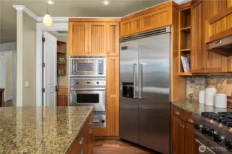 There is a butler's pantry and wet bar adjacent to the kitchen