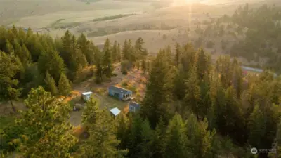 Cabins on upper 20 acres include solar power and woodstoves