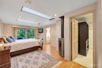 The thoughfully designed primary suite was part of theremodel completed by the previous owners.  there are black out blinds on the skylights too!