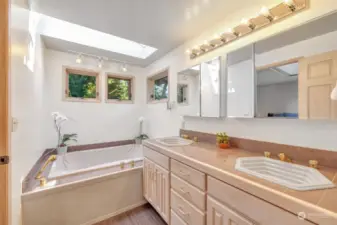 Jetted Tub and Double Sinks in the Spa-like Primary Bath.