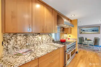 Under cabinet lighting and stunning countertops.