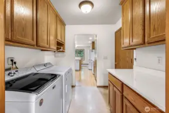 laundry room is located off kitchen & garage
