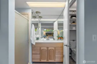 Refreshed primary bath with shower and separate toilet room.