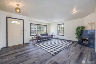 Living room is roomy and bright.
