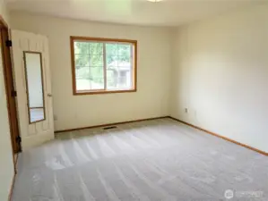 Large primary bedroom. New carpets installed 7/18!