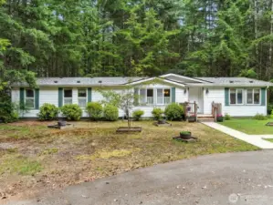 Welcome to this well-maintained manufactured home on 4.7 serene acres.