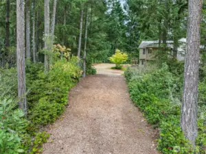 Second driveway for RV parking and backyard access