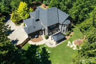 Privacy abounds on this 35,000+ sqft lot