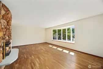 Bay window with tile seating ledge overlooking front yard