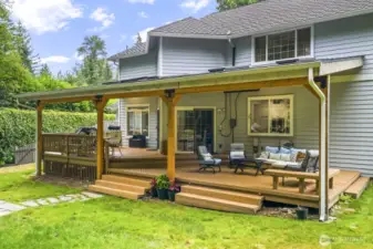Step outside to your private west-facing backyard oasis, fully fenced and backing to a lush greenbelt.