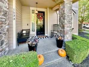 Welcome!! Ample covered porch greets visitors and offers a great place to sit a spell.
