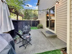 Sweet patio off dining room. Trellis surrounding patios add lots of charm.
