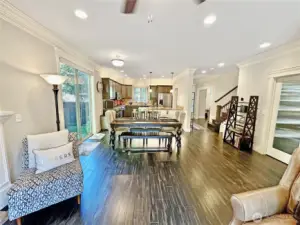 View from great room of dining and kitchen.  Pantry is to the right.