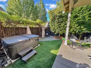 Another view of hot tube and additional patio area.