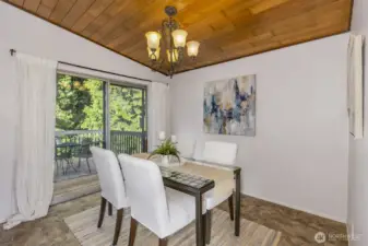 Ding room with slider to the deck & backyard.