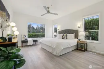 Primary bedroom is light and bright with comfortable layout.