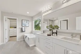 top floor primary suite provides lots of natural light!  Primary bath with dual sinks, soaking tub and tiled walk-in shower. Built in closet is beyond.   For representation purposes only colors may vary.