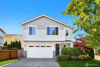 Charming craftsman with stone accents and covered entry porch