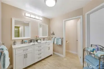 Large newly remodeled bathroom, water closet in back with a huge storage room behind the towel stand.
