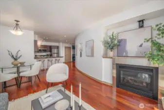 Ample living/dining/kitchen space with pass through fireplace.