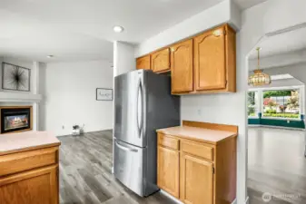 Kitchen with stainless refrigerator