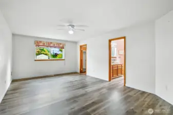 Primary bedroom with views to backyard