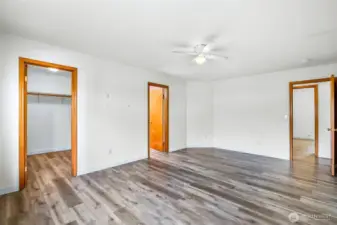 Primary bedroom with walk-in closet and private bath
