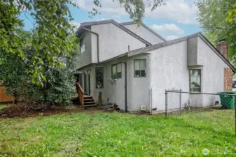 Spacious fully fenced backyards with decks for both units.