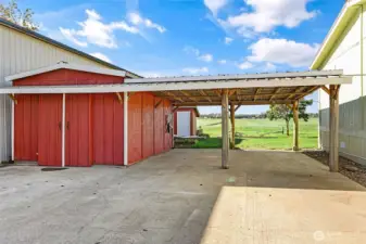 Small shop with electric, double carport & EV charging station