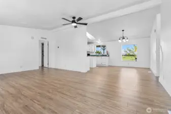 Large open liv room opens to dining and kitchen