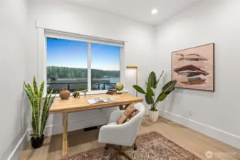 Flexible main-level room ready to serve as an office, glam dressing space, or your own private fitness studio