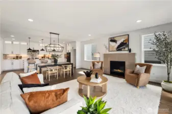 Great Room (reverse angle): From the fireplace focal point to the chef’s kitchen beyond, the great room embodies open-concept living at its best. Whether hosting a holiday dinner or enjoying a quiet morning, this space adapts to every lifestyle need.  These photos are of the actual, staged home being sold at Foxmoore. However, all photos, renderings, site maps, and floorplans are for visualization purposes only. Plans, colors, building orientation, finishes, home outlook, and other details can and WILL vary.