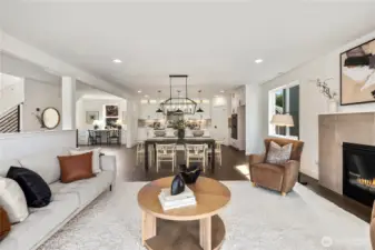 Great Room Overview: The open great room showcases a natural flow from living to dining to kitchen, highlighted by clean lines and abundant light. A welcoming layout designed for both relaxation and gathering.  These photos are of the actual, staged home being sold at Foxmoore. However, all photos, renderings, site maps, and floorplans are for visualization purposes only. Plans, colors, building orientation, finishes, home outlook, and other details can and WILL vary.