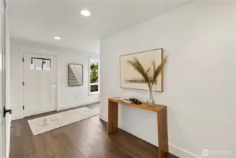 Lower Level Entry/Foyer: A welcoming entry with wide-plank flooring and natural light sets the tone for the home’s modern design. Clean lines and thoughtful finishes create a fresh, inviting first impression.  These photos are of the actual, staged home being sold at Foxmoore. However, all photos, renderings, site maps, and floorplans are for visualization purposes only. Plans, colors, building orientation, finishes, home outlook, and other details can and WILL vary.