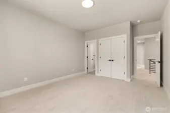 Bedroom with ensuite bathroom on upper floor