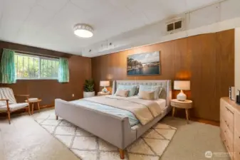 Staged view of the 5th bedroom located on the lower level.