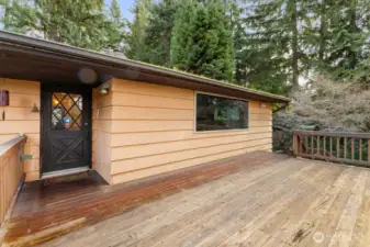 Large front deck and main entry. Home features a newer furnace and hot water heater, large storage shed and more!